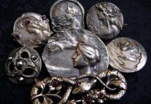 Serpents and Sorceresses—a decadent assortment of antique Art Nouveau brooches and buttons, including interlaced serpents accented with shimmering garnets and marcasite, a fluttering of bats, plus the witchy women who are perfectly content to share their time with either (and perhaps be convinced to tell your fortune while doing so).