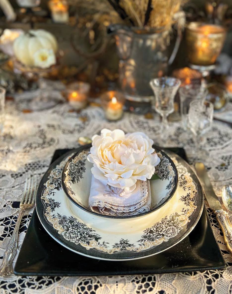 Celebrate autumn with an enchanting tablescape that evokes your inner witch. Explore the fusion of harvest abundance and introspective magic. Dive into a subdued color palette, ravens, crystal balls, and vintage heirlooms. Embrace the duality of life with contrasting elements. Whether classic or Gothic, this tablescape sparks conversation and invites the mysterious inner witch to awaken this fall.