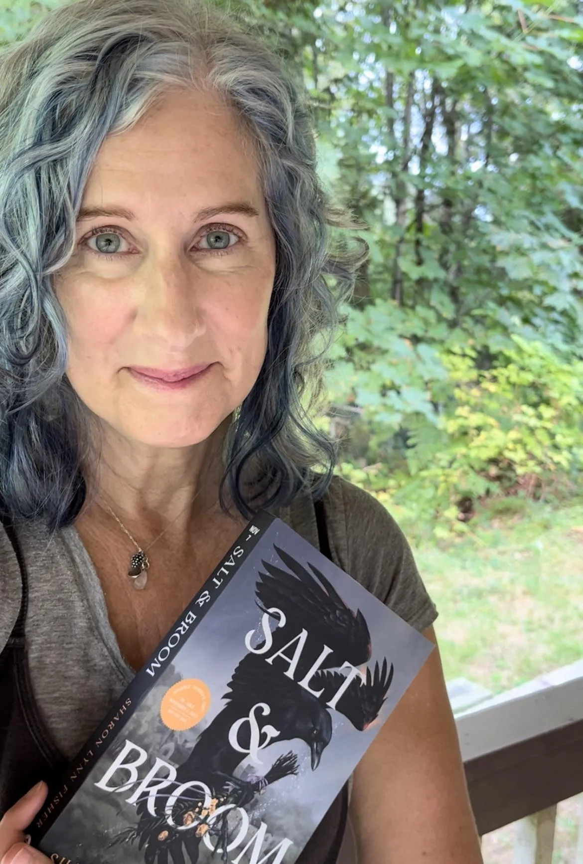 Author Sharon Lynn Fisher and her newest book Salt & Broom, a witch retelling of the classic Jane Eyre